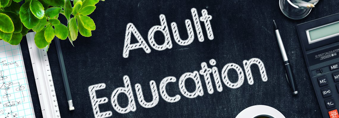 sign with Adult Education on it