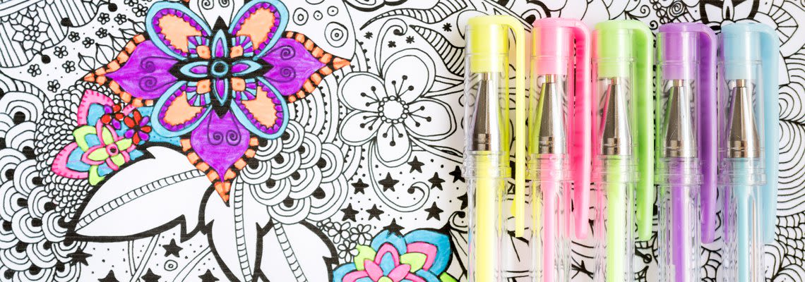 colorful pens on a coloring page