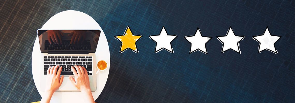 One Star Rating with person using a laptop