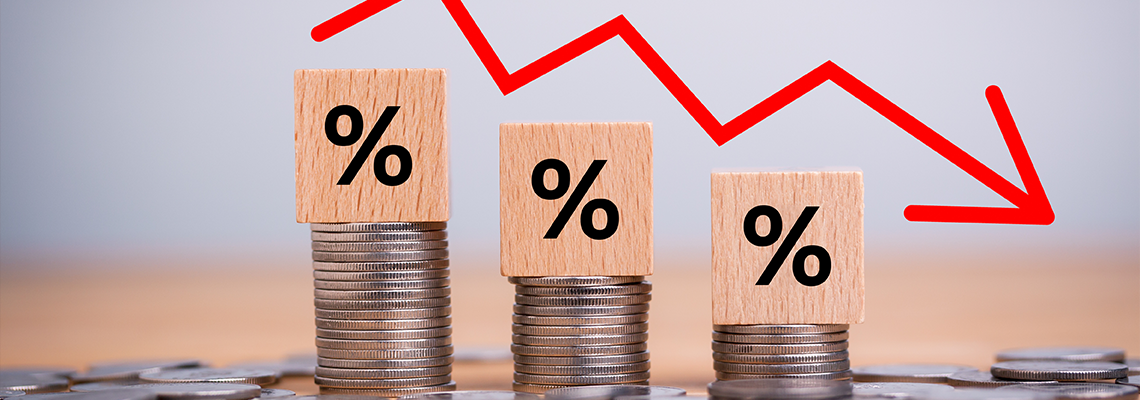 Stack of Coin, Bar Chart and Red Graph Trending Downwards