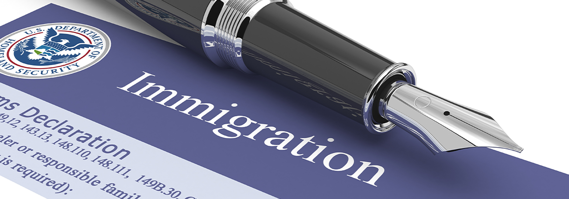 Customs Document of Immigration and A Pen