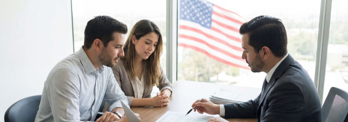Couples consulting with immigration attorney
