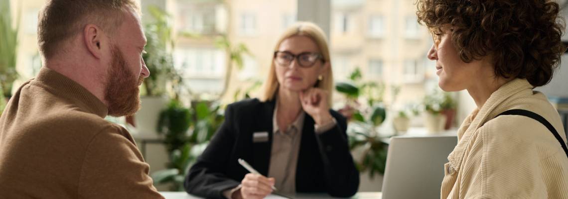 Couples consulting with immigration attorney