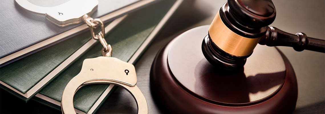 Crime and violence concept with handcuffs