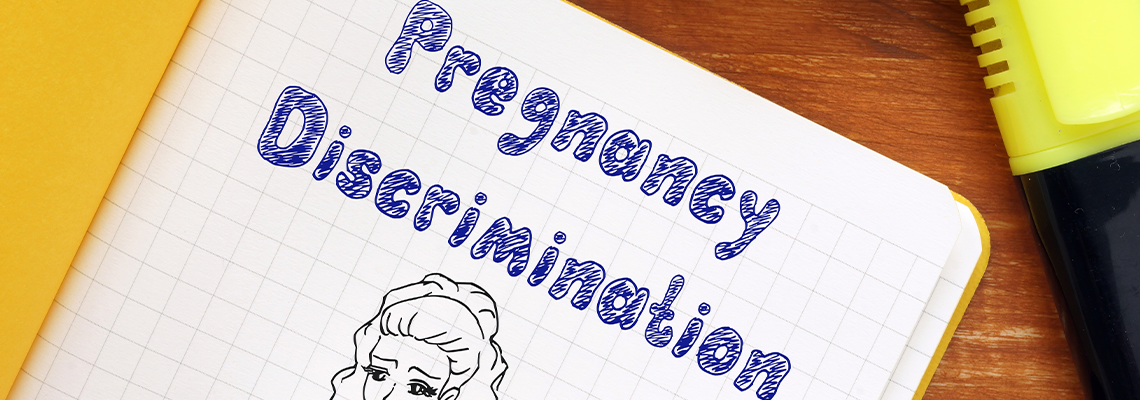 Business concept about Pregnancy Discrimination with sign on the sheet