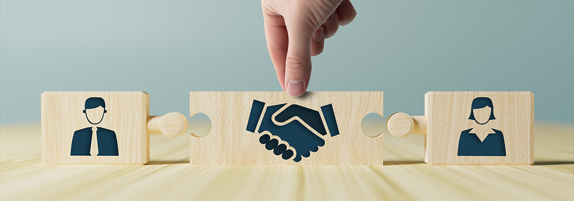 Icons of a woman and a man and shaking hands in the act of consent
