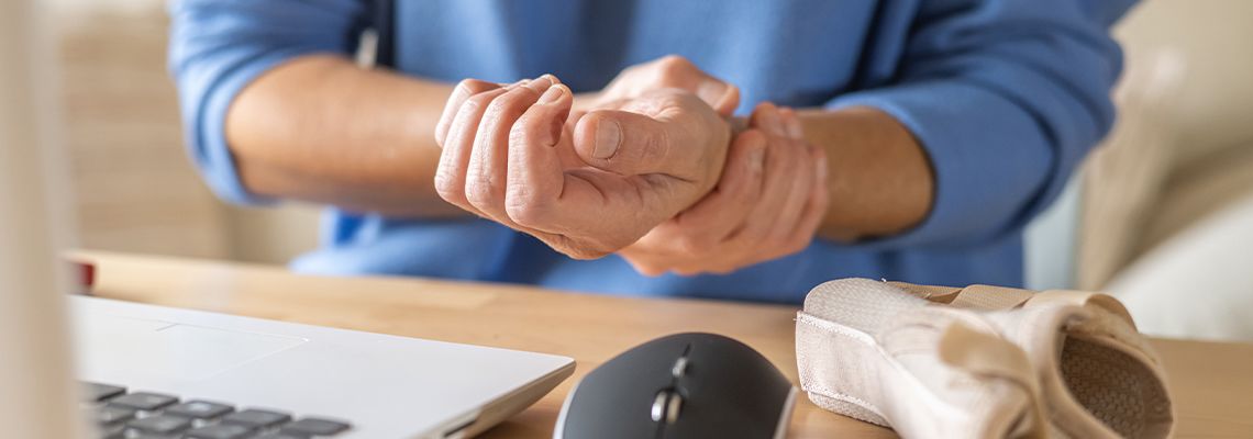 Man with wrist pain from continuous typing