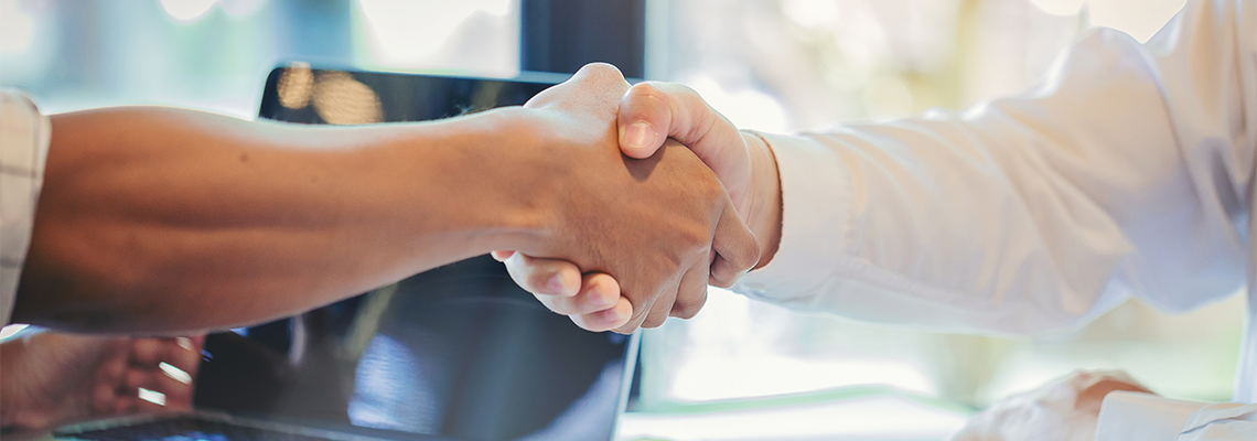 Businessman handshake at business meeting after negotiations with business partner