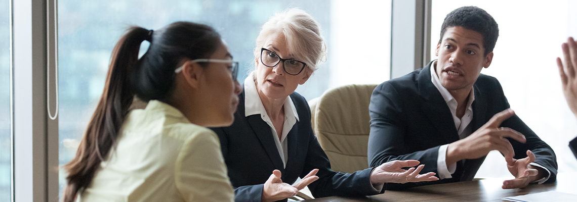 Diverse employees dispute with Asian female workers