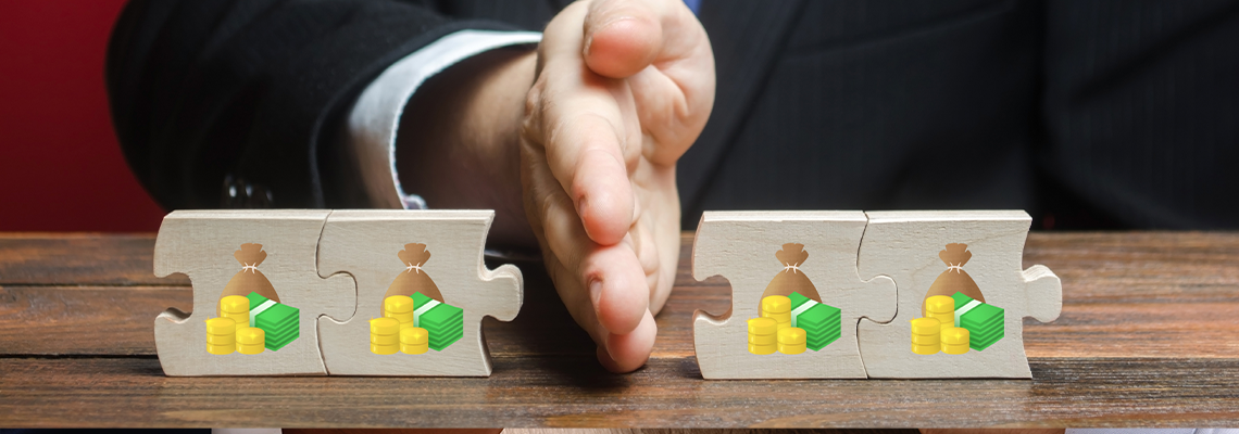 A businessman splits money into two equal parts