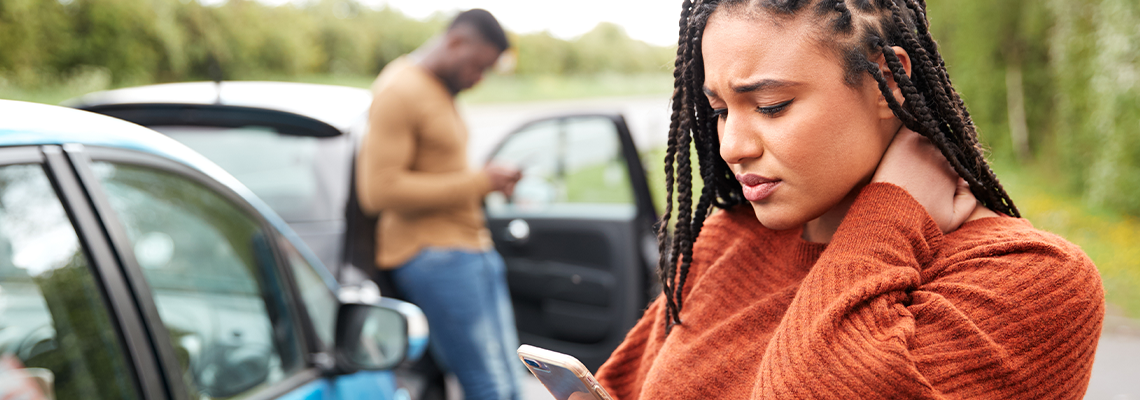 Female Motorist Involved In Car Accident Calling Insurance Company