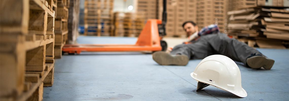 Injured worker in a warehouse