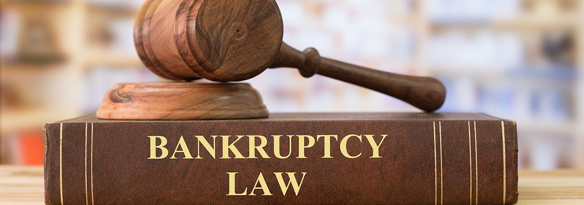 Bankruptcy law book and gavel