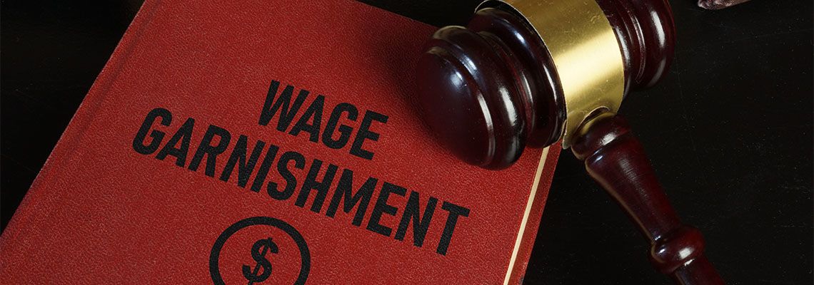 Wage Garnishment Law Book and Gavel