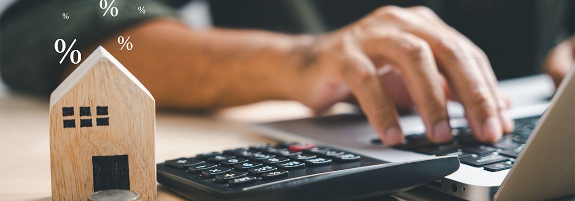 Person calculating home loan interest
