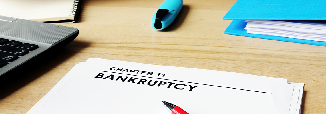 Chapter 11 Bankruptcy papers on the manager desk