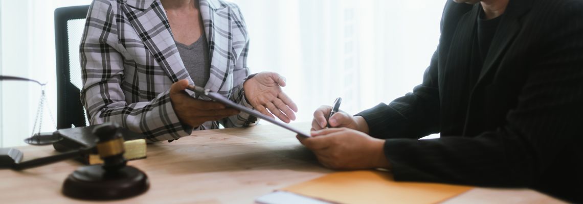 Businessman consults an attorney for legal advice