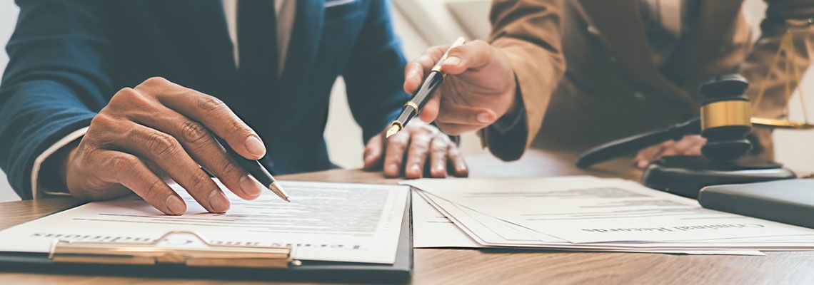 Businessman consulting with attorney