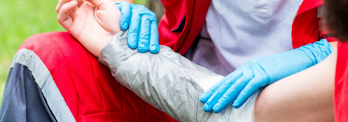 Paramedic treating a burn injury