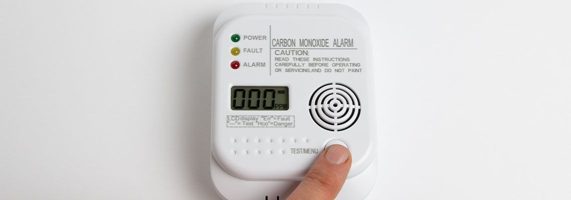 Carbon monoxide detector on white wall