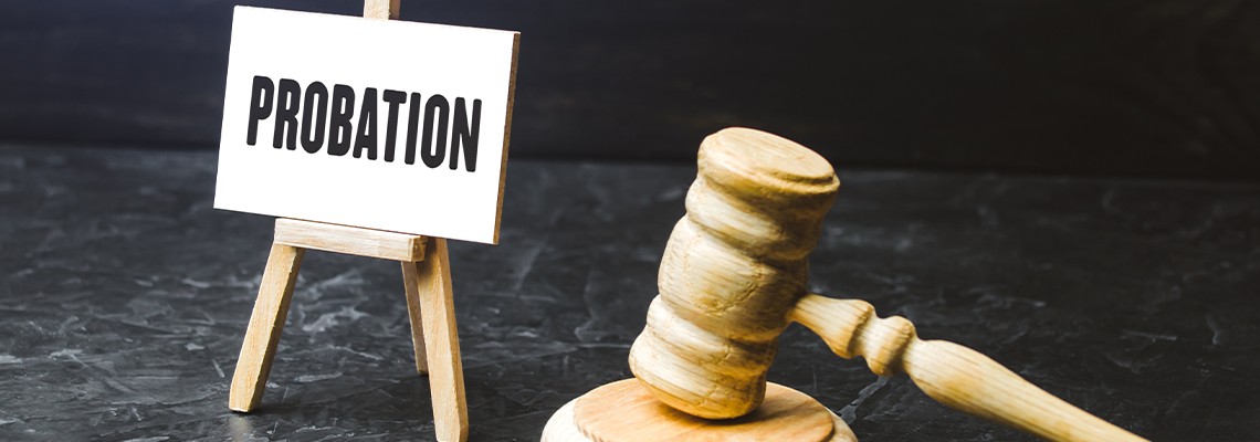 Probation and judge's gavel. Consideration of an application for early release from imprisonment