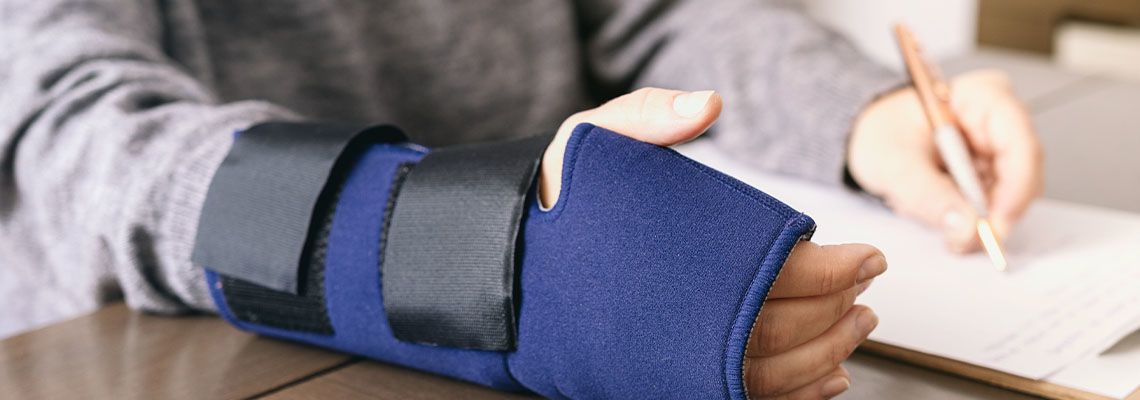 Injured worker filling compensation form