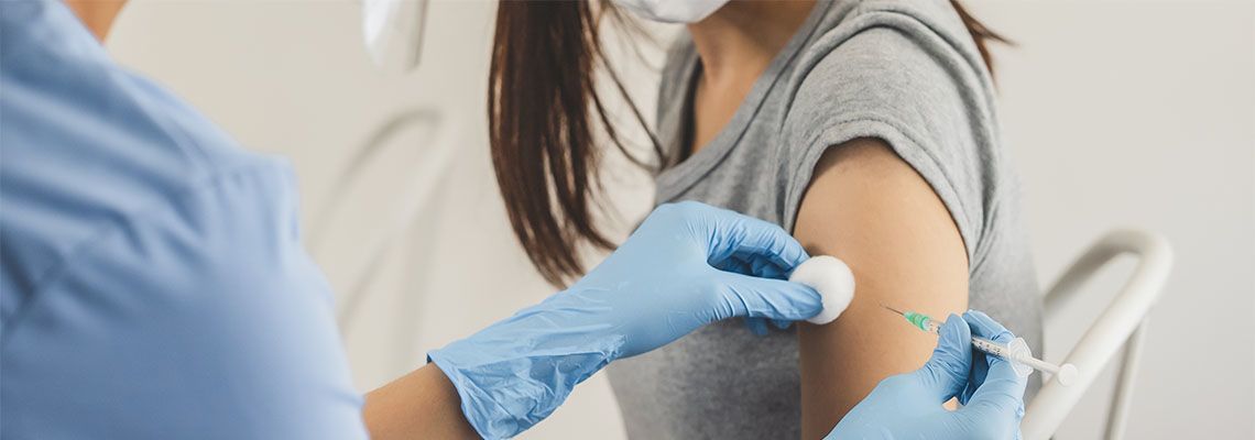 Woman getting vaccinated