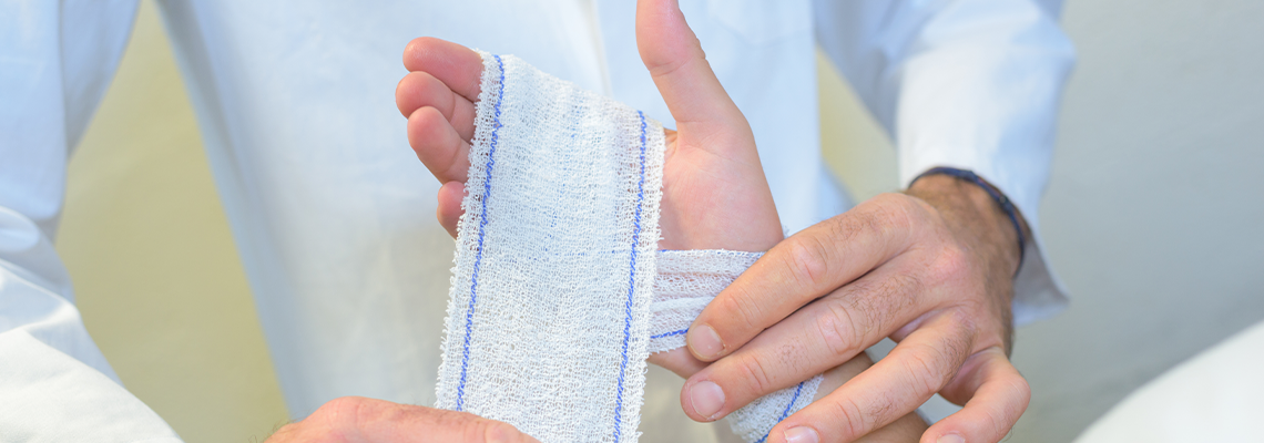 Doctor treating a burn wound