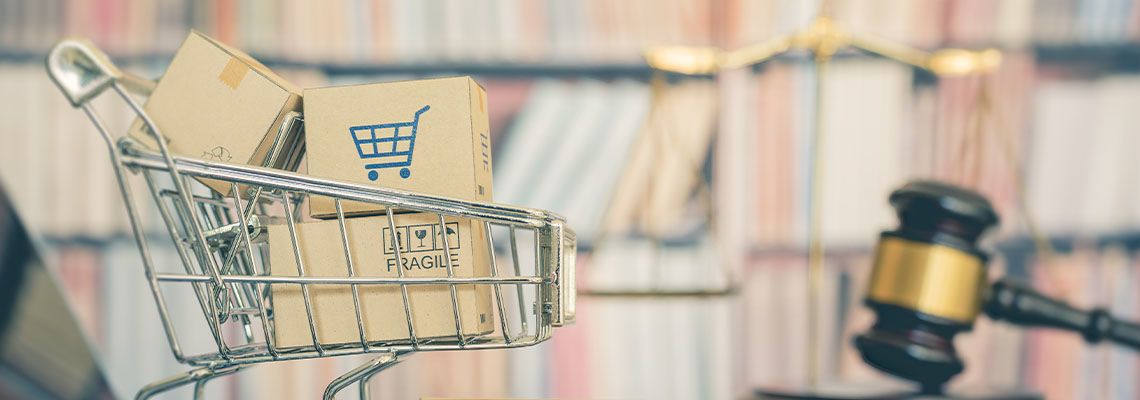 Shopping cart with gavel in background