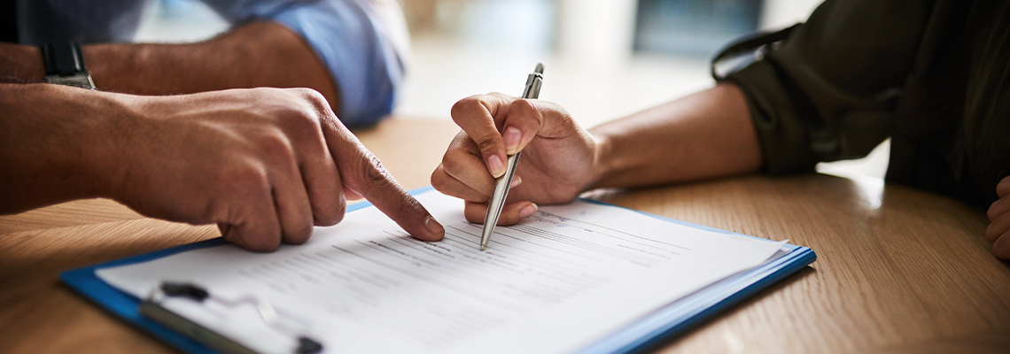 Lawyer, broker or HR manager signing a contract agreement with client or employee