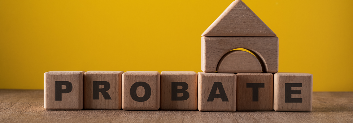 Wooden block with text and house shape