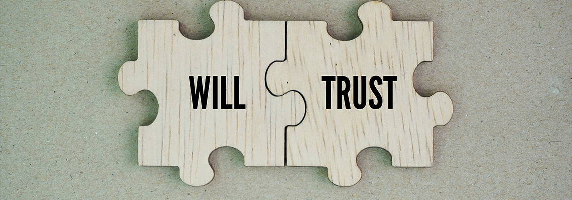 Wooden puzzle with the words will and trust