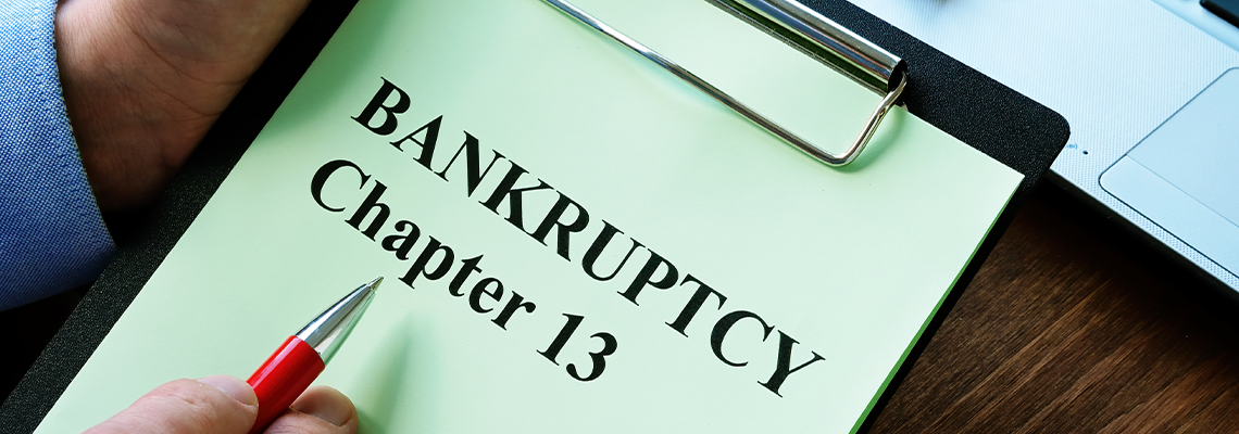 Man reads bankruptcy chapter 13 law in the office