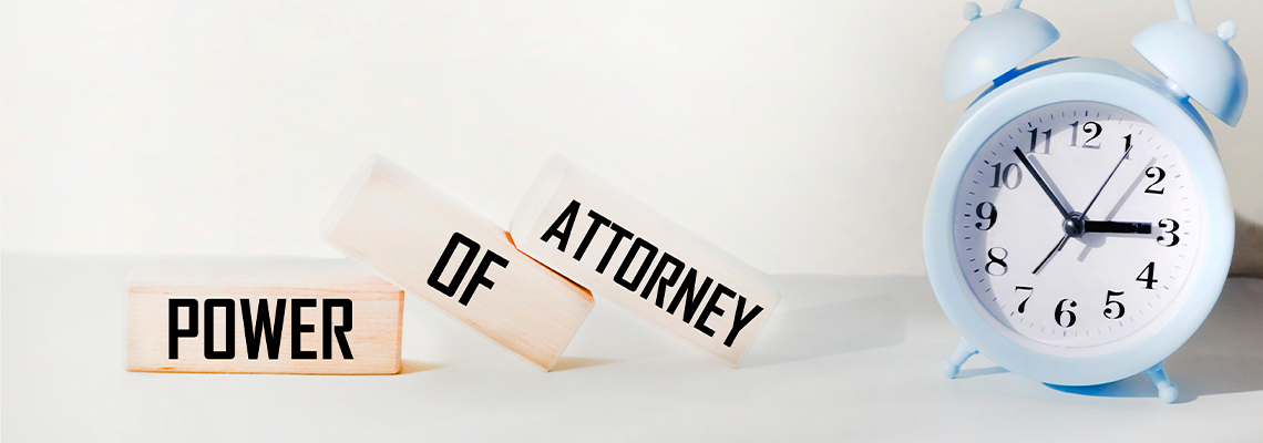Wooden blocks with the inscription Power of Attorney on a white background