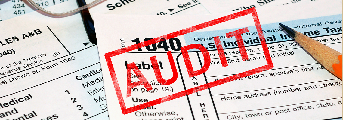 Tax audit document and a pen