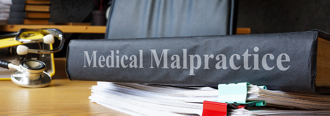 Medical malpractice documents on a table
