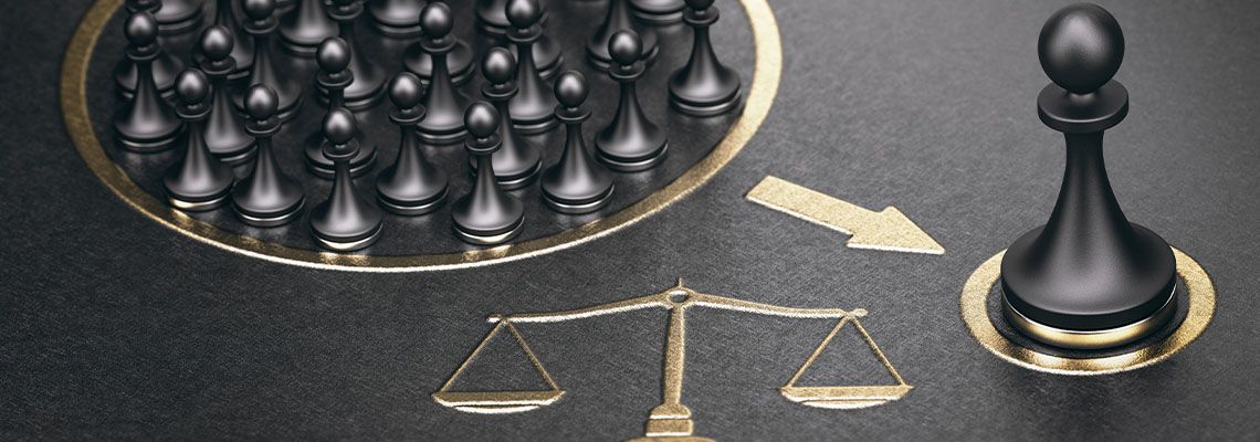 Image with chess pieces representing collective redress