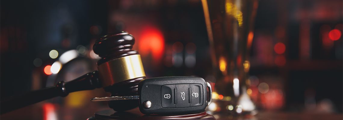 Gavel, Car Keys and Glass of Alcohol