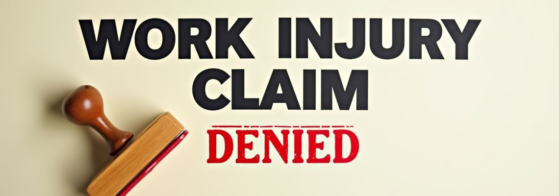 Work Injury Claim Denied Stamp on Light Background