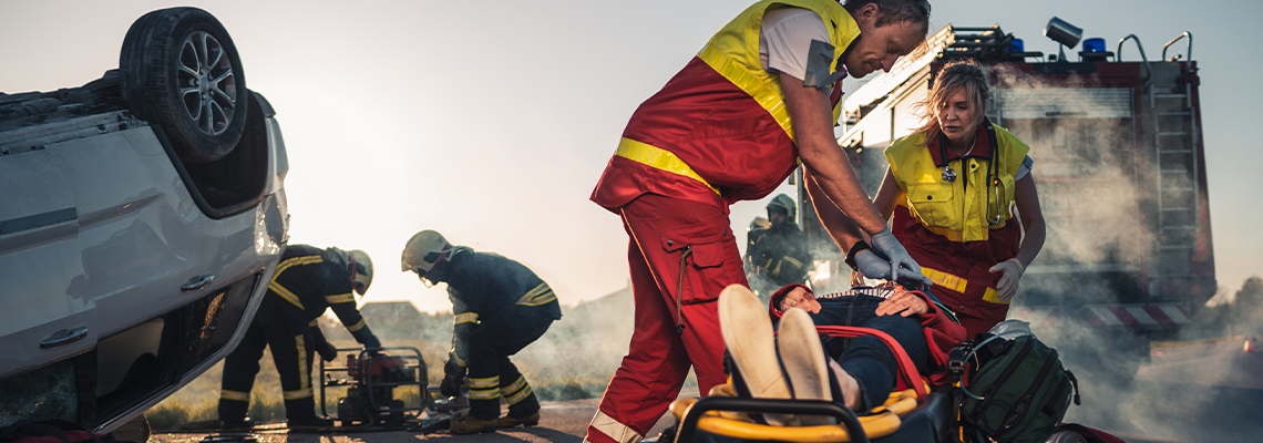 Paramedics Saving Life of a Female Victim who is Lying on Stretchers