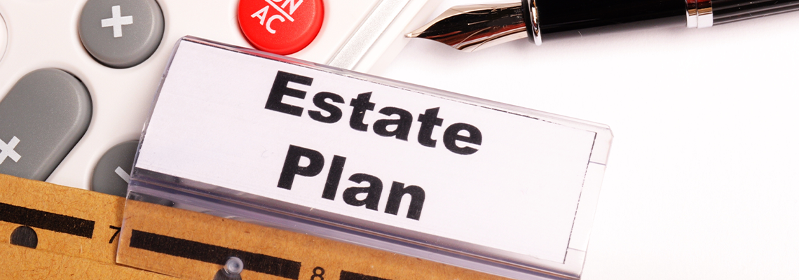 Estate plan paper clip and pen on table