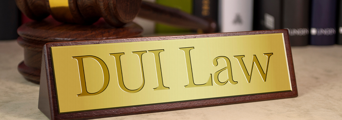 Golden sign with gavel and dui law
