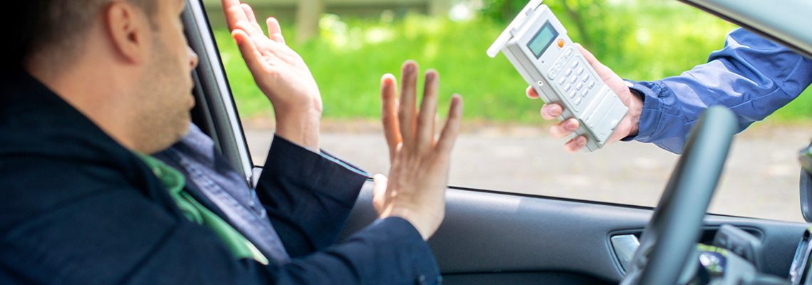 Driver due to being subject to test for alcohol content with use of breathalyzer