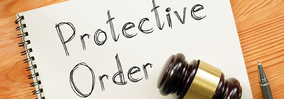 Protective Order is shown on the photo using the text