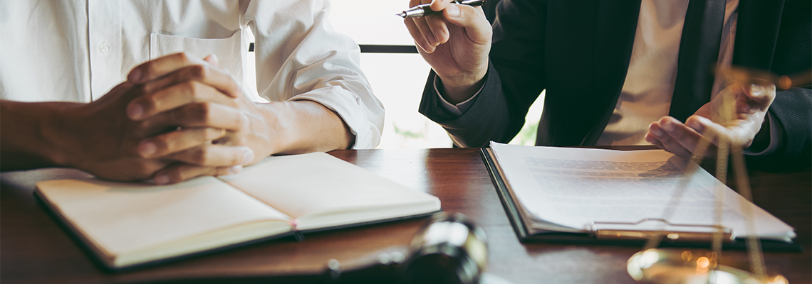 Lawyer explained to the client about the law that must be brought against the court case