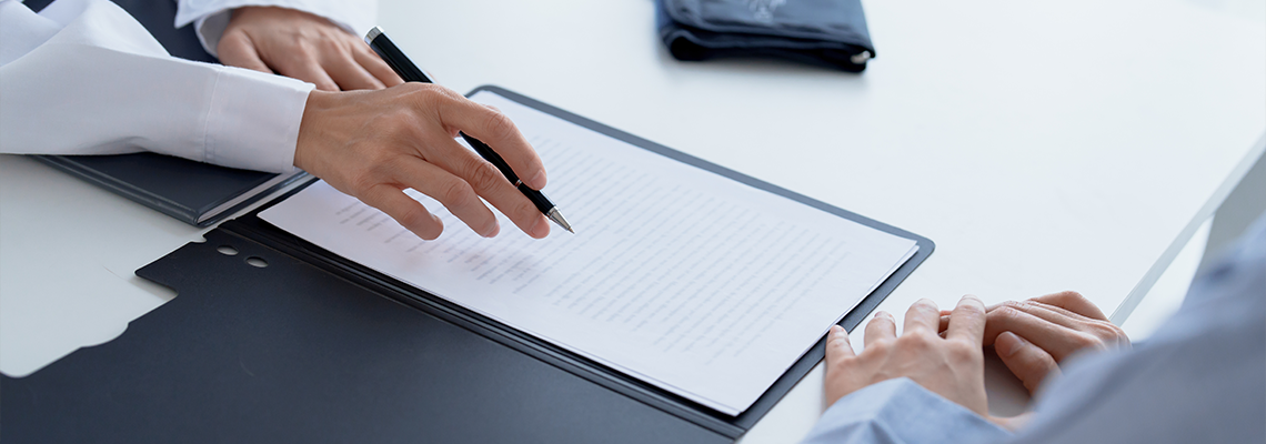 Doctor explaining treatment plan and obtaining informed consent