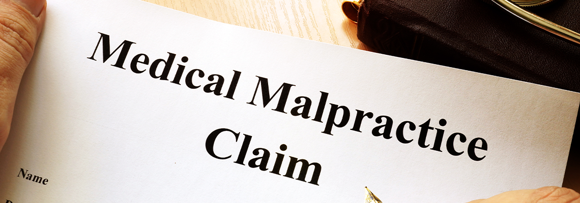 Medical Malpractice Claim form on a table