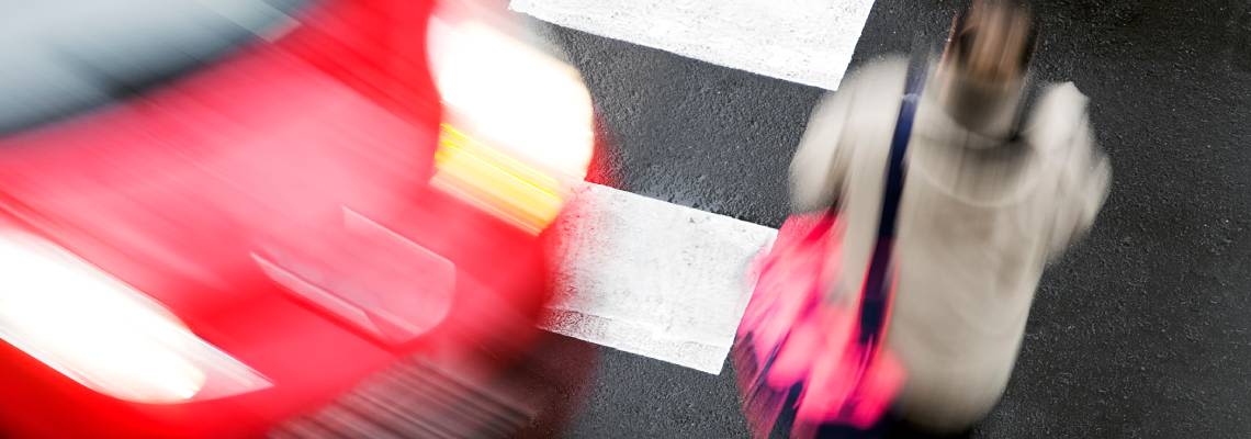 Car About to Collide with pedestrian in road