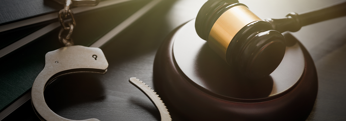 Crime and violence concept with handcuffs