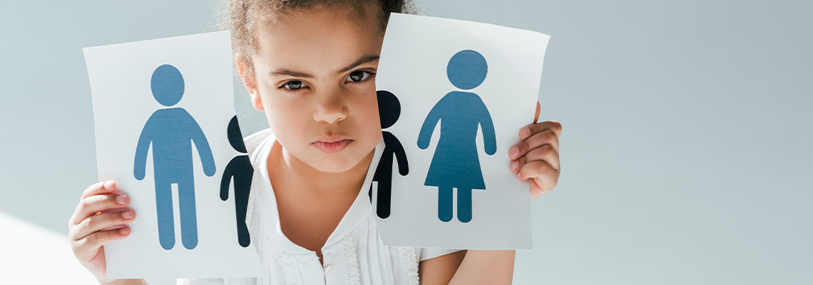 African american child holding ripped paper with family on white